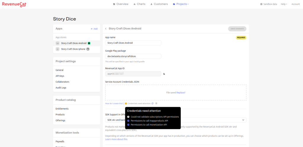 Captura de pantalla de la plataforma RevenueCat mostrando el panel de configuración de un proyecto de una aplicación llamada "Story Craft Dices Android". Se resalta un error de "Credentials need attention", indicando problemas con permisos de API.